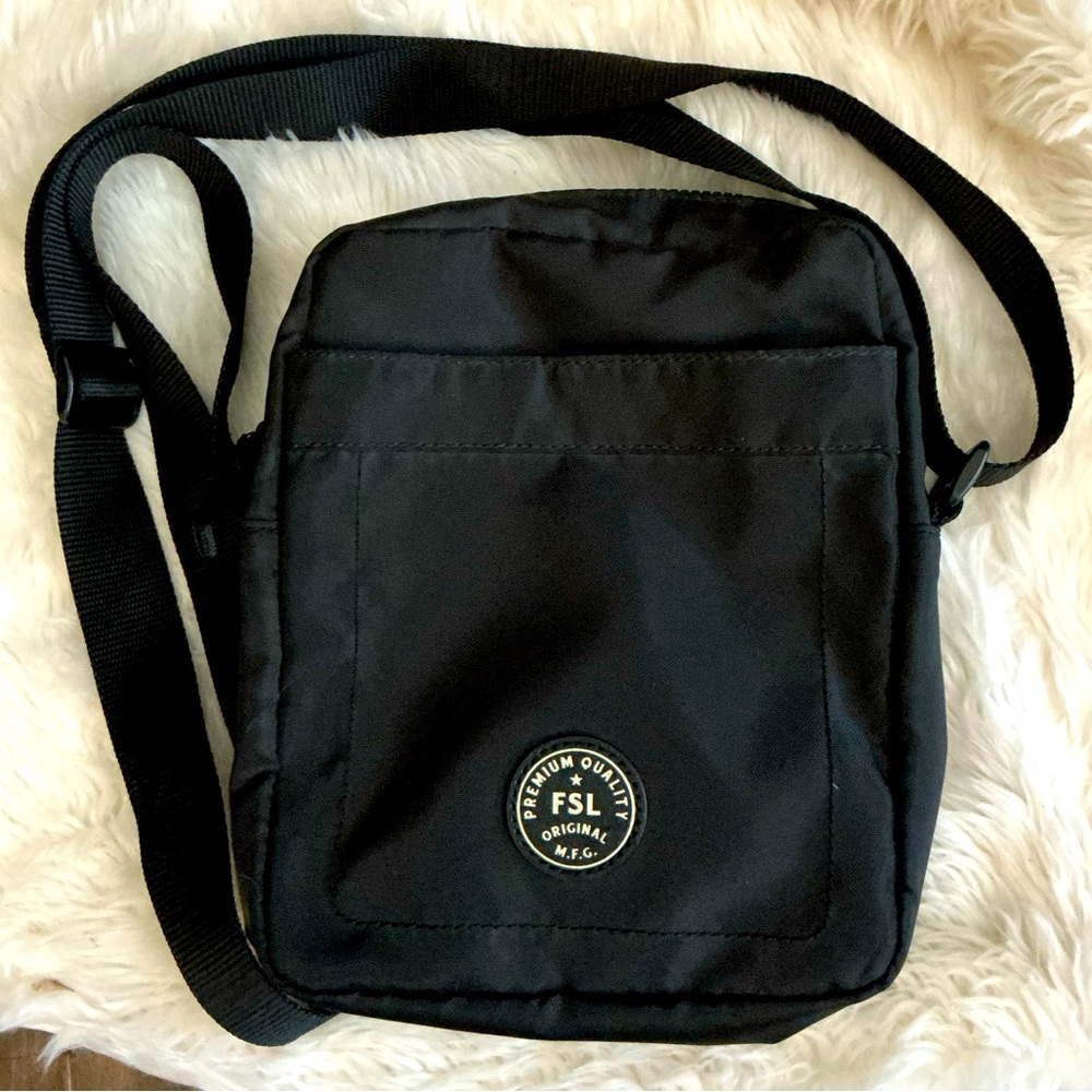 Fossil Black Messenger Bag with Adjustable Strap and Durable Fabric